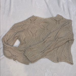 Super cute sweater with holes